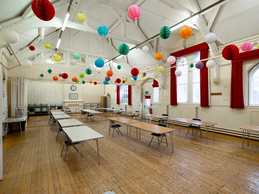 Image of a colourful decorated community hall.